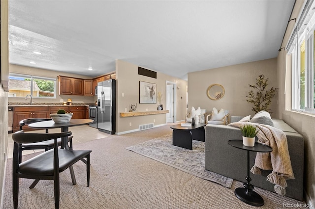 2380 W Baltic Pl, Englewood, CO 80110 - living room featuring light carpet and recessed lighting