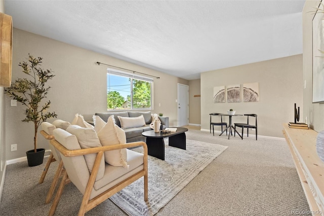 2380 W Baltic Pl, Englewood, CO 80110 - carpeted living room featuring baseboards
