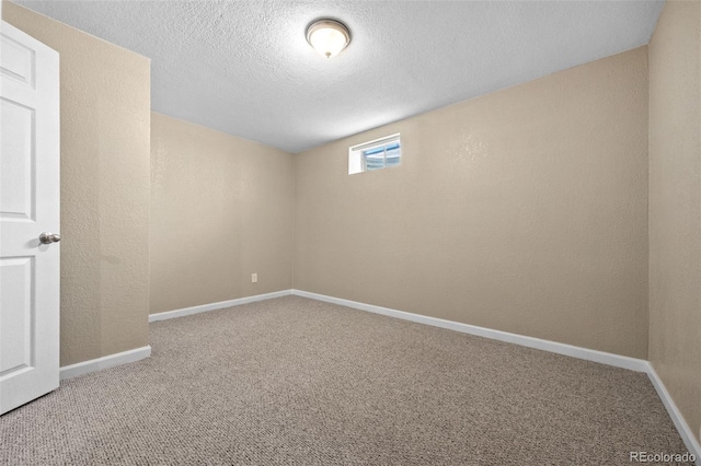 2380 W Baltic Pl, Englewood, CO 80110 - basement with carpet flooring, a textured ceiling, and a textured wall