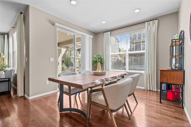 827 Sundance Ln, Erie, CO 80516 - dining area with recessed lighting, wood finished floors, visible vents, and baseboards