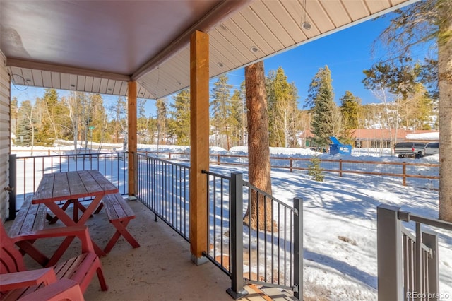 view of snow covered patio