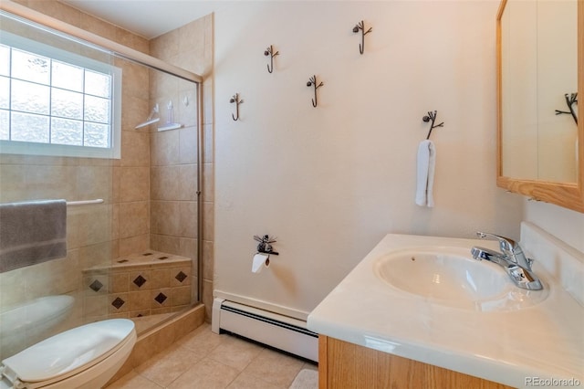 full bath featuring tile patterned flooring, toilet, a baseboard heating unit, vanity, and a shower stall