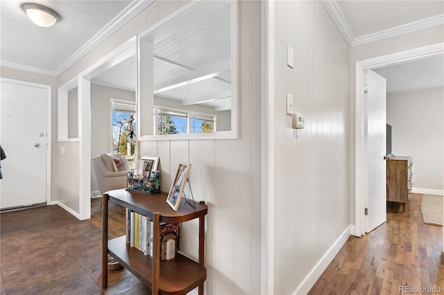 entrance foyer featuring ornamental molding and dark hardwood / wood-style floors