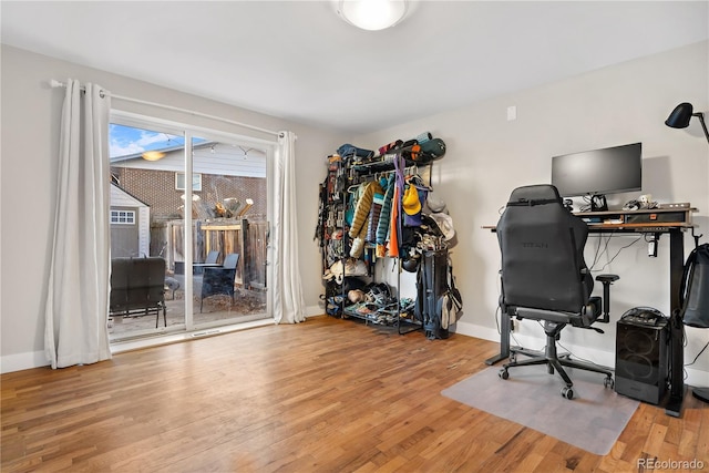 office with wood-type flooring