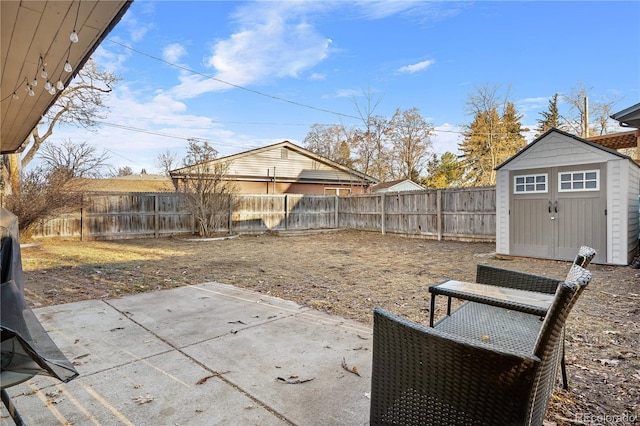 view of patio with a storage shed