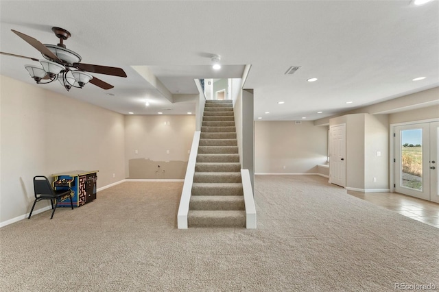 39245 Big Springs Rd, Rush, CO 80833 - below grade area featuring recessed lighting, carpet flooring, visible vents, french doors, and stairway