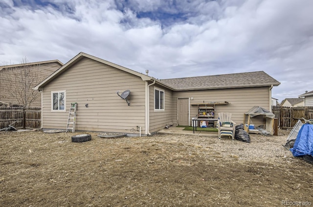 back of property with a patio area