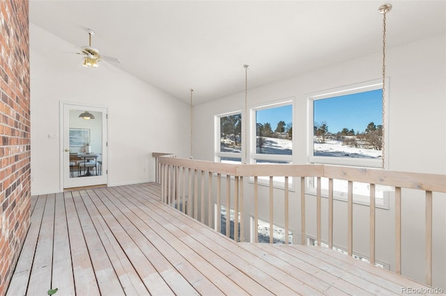 wooden deck featuring ceiling fan