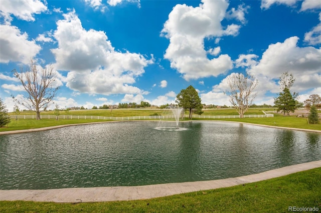 view of water feature with a rural view