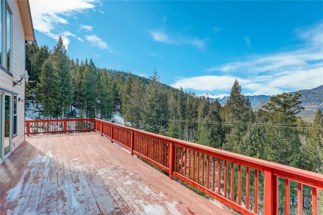 wooden terrace with a mountain view