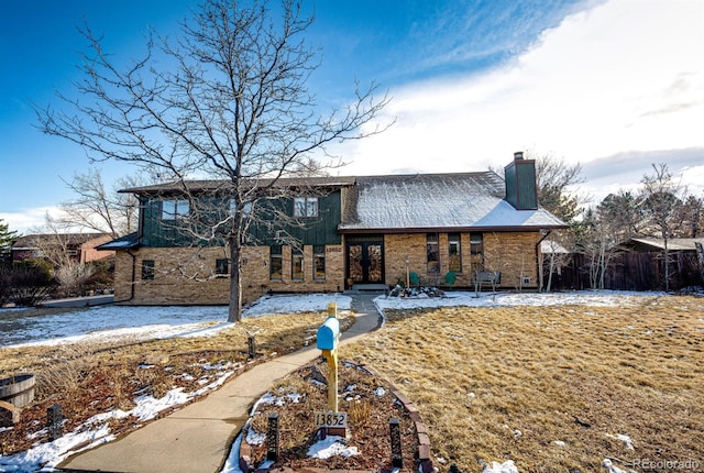 view of front of home with a lawn