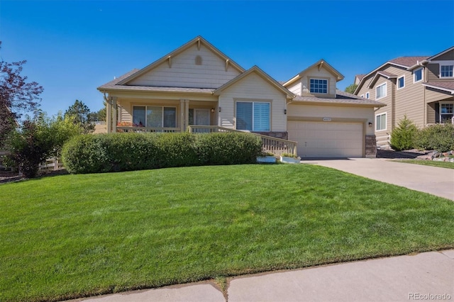 view of front facade with a front yard and a garage