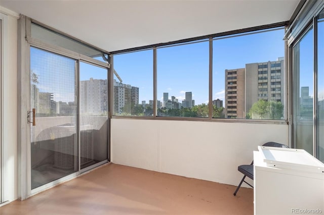 740 N Pearl St Unit 606, Denver, CO 80203 - unfurnished sunroom with a skyline view