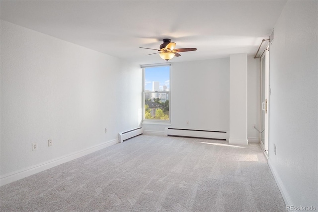 740 N Pearl St Unit 606, Denver, CO 80203 - empty room featuring baseboard heating, a ceiling fan, and carpet