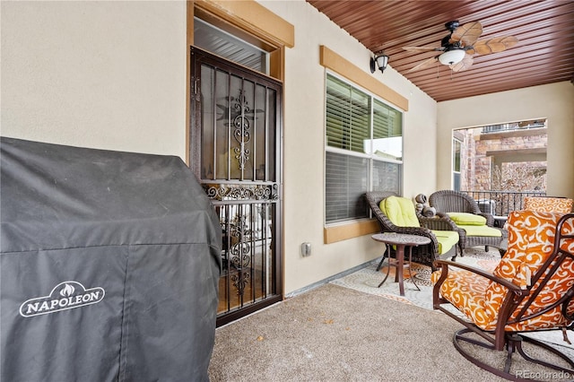 exterior space featuring ceiling fan