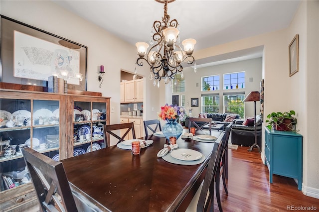 22428 Quail Run Ln, Parker, CO 80138 - dining space with a chandelier and wood finished floors