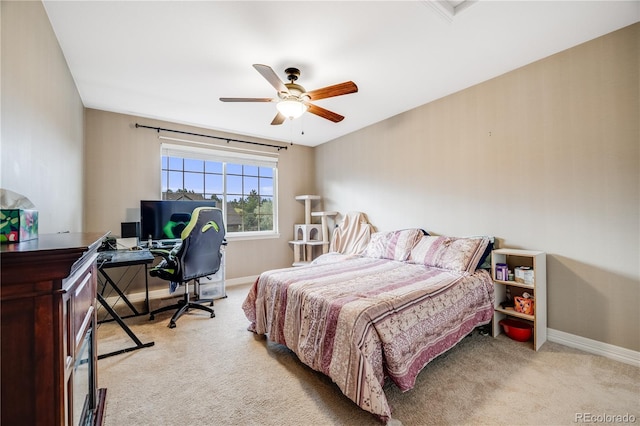 22428 Quail Run Ln, Parker, CO 80138 - bedroom with light colored carpet, baseboards, a desk, and ceiling fan
