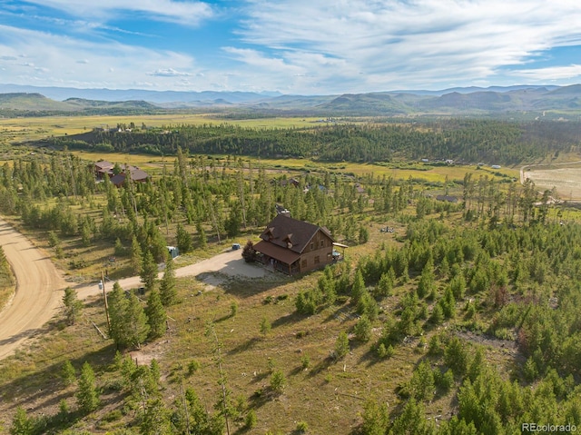 aerial view featuring a mountain view and a rural view