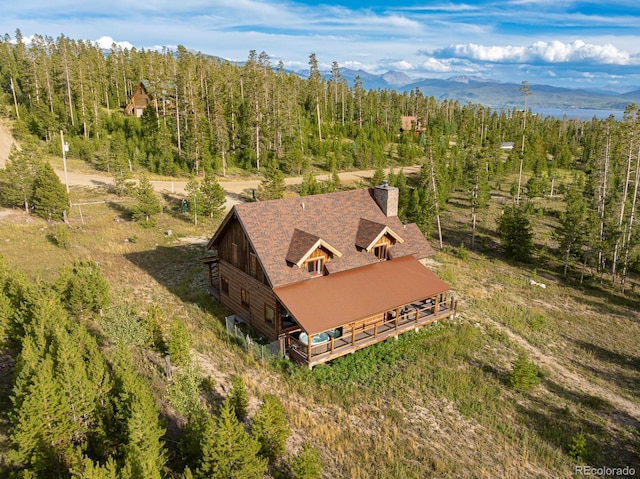 birds eye view of property featuring a mountain view