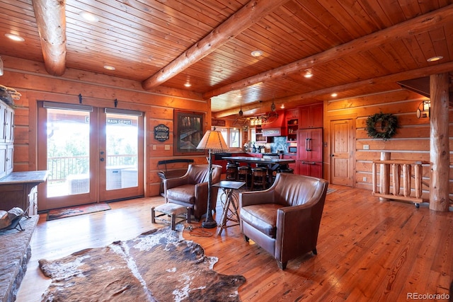 living room featuring wood walls, wood ceiling, and hardwood / wood-style floors