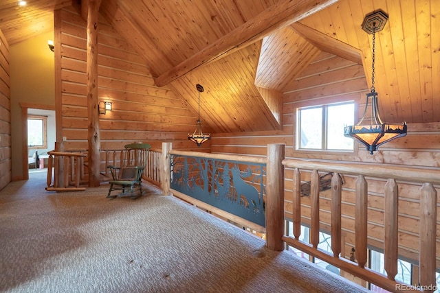 living area featuring carpet, beam ceiling, wood ceiling, wood walls, and high vaulted ceiling