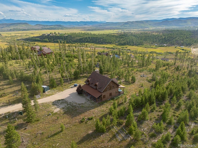 bird's eye view featuring a mountain view and a rural view