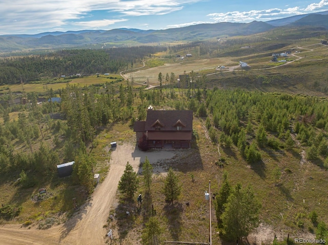 bird's eye view featuring a mountain view and a rural view