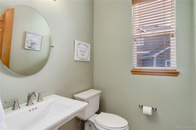 12754 Angelina Dr, Peyton, CO 80831 - half bath with a sink and toilet