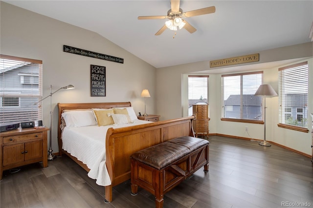 12754 Angelina Dr, Peyton, CO 80831 - bedroom featuring lofted ceiling, multiple windows, dark wood-style flooring, and ceiling fan