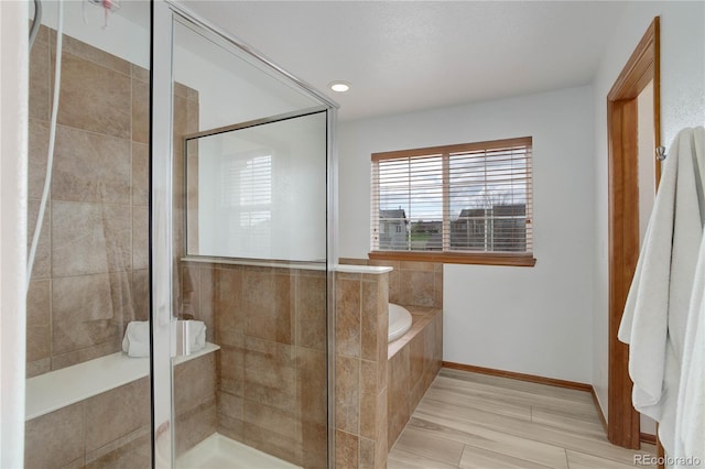 12754 Angelina Dr, Peyton, CO 80831 - full bathroom featuring a garden tub and a shower stall