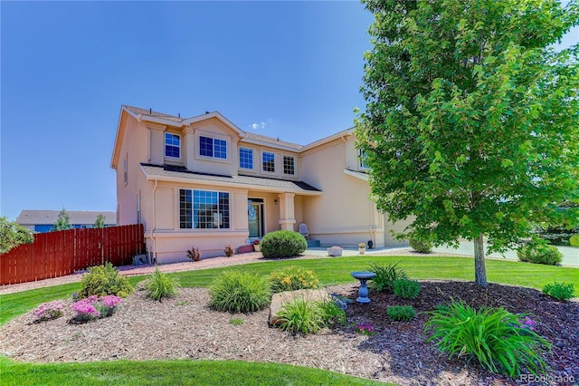 12754 Angelina Dr, Peyton, CO 80831 - traditional-style house featuring stucco siding