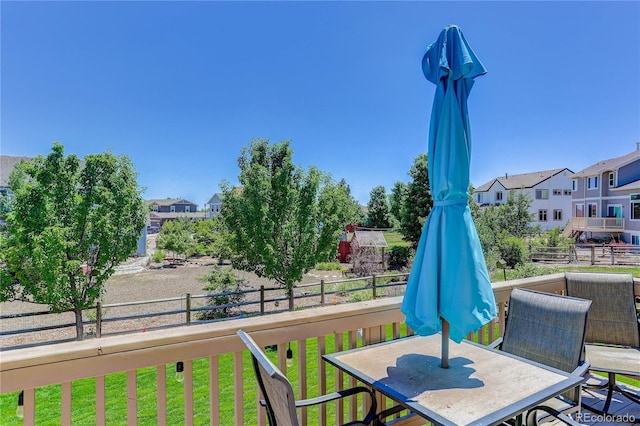 12754 Angelina Dr, Peyton, CO 80831 - deck featuring outdoor dining area and a residential view
