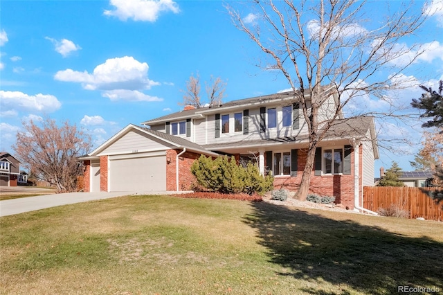 view of front of house featuring a front lawn and a garage