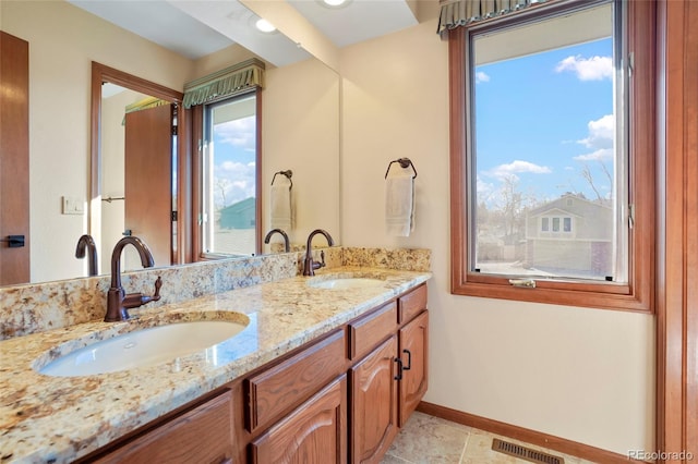 bathroom featuring vanity