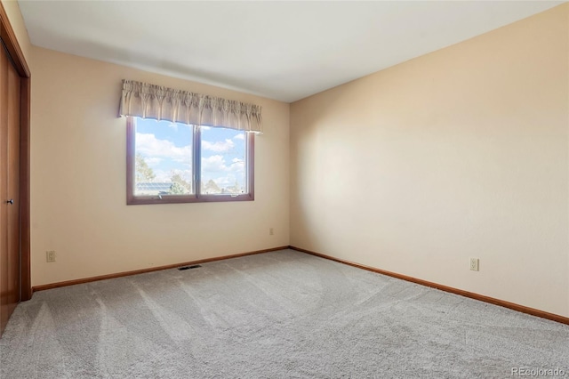 empty room with carpet floors