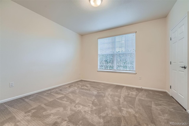 empty room with carpet floors