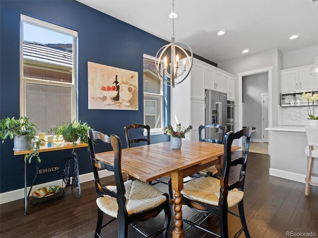 6268 Dakota Ridge Dr, Littleton, CO 80125 - dining space with dark wood-style floors, a chandelier, recessed lighting, and baseboards