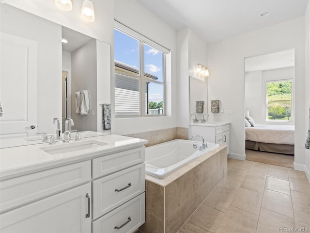 6268 Dakota Ridge Dr, Littleton, CO 80125 - ensuite bathroom featuring vanity, a bath, and tile patterned flooring
