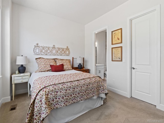 6268 Dakota Ridge Dr, Littleton, CO 80125 - bedroom featuring carpet floors, baseboards, and ensuite bath