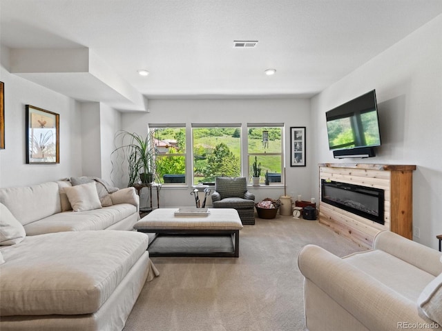 6268 Dakota Ridge Dr, Littleton, CO 80125 - carpeted living room with a glass covered fireplace and recessed lighting