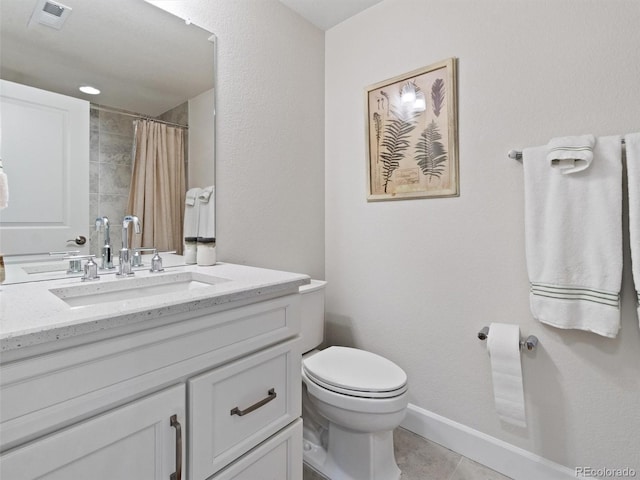 6268 Dakota Ridge Dr, Littleton, CO 80125 - bathroom featuring vanity, toilet, tile patterned floors, curtained shower, and baseboards