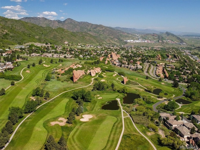 6268 Dakota Ridge Dr, Littleton, CO 80125 - aerial view of property and surrounding area featuring a mountain backdrop, nearby suburban area, and a local golf course