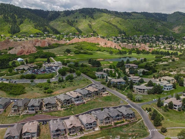 6268 Dakota Ridge Dr, Littleton, CO 80125 - aerial view of property and surrounding area with a water and mountain view and nearby suburban area
