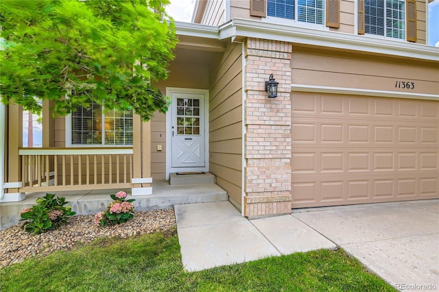11363 Latigo Ln, Parker, CO 80138 - entrance to property with brick siding and a garage