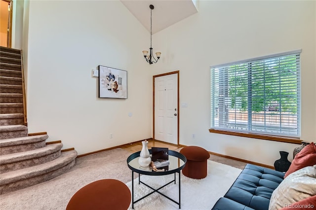 11363 Latigo Ln, Parker, CO 80138 - living area featuring stairs, carpet floors, a chandelier, and high vaulted ceiling