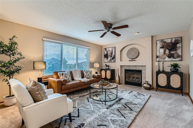 11363 Latigo Ln, Parker, CO 80138 - carpeted living room featuring a ceiling fan, a tiled fireplace, and a textured ceiling
