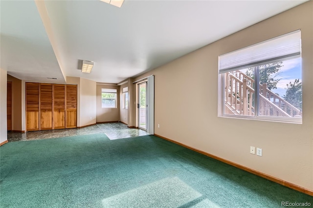 11363 Latigo Ln, Parker, CO 80138 - unfurnished living room with carpet floors and baseboards