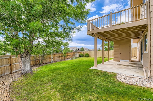 11363 Latigo Ln, Parker, CO 80138 - fenced backyard featuring a patio area and a deck