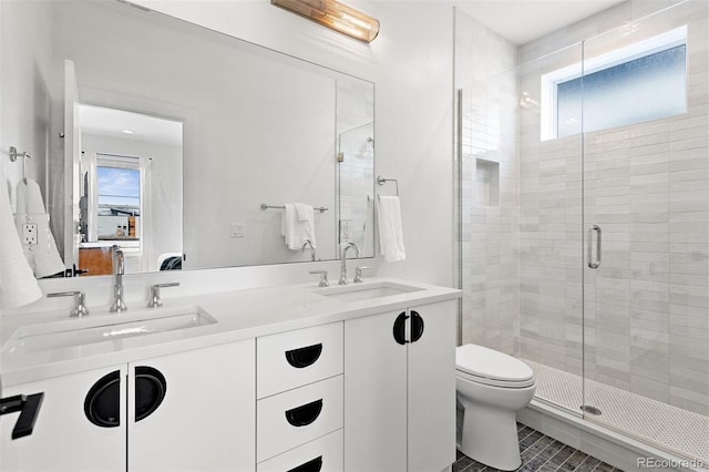 1250 W Osceola St Unit 2, Denver, CO 80204 - full bathroom featuring a shower stall, double vanity, and tile patterned floors