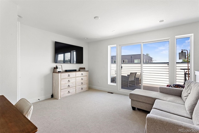 1250 W Osceola St Unit 2, Denver, CO 80204 - living area with baseboards and light colored carpet
